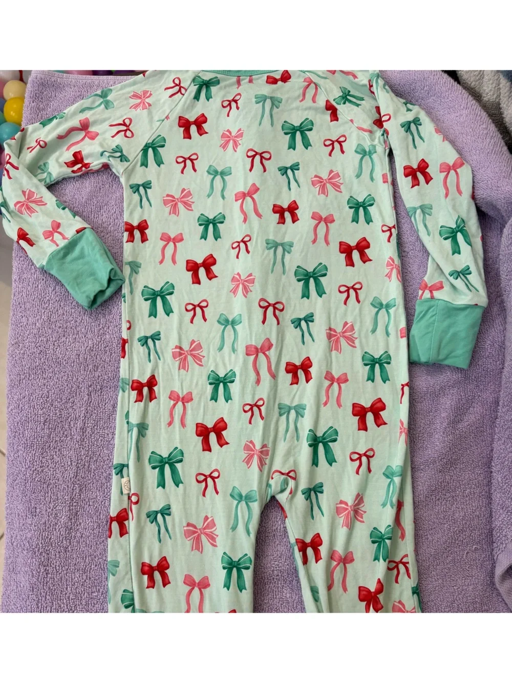 Holiday bows zip pajama